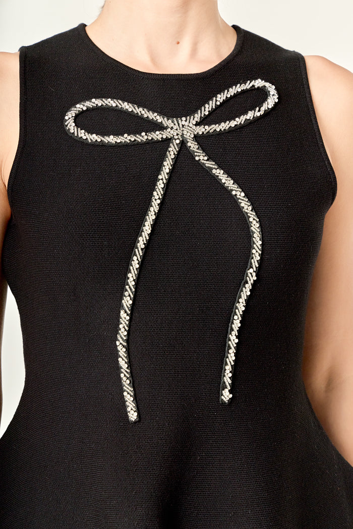 Ribbon Peplum Knit Top